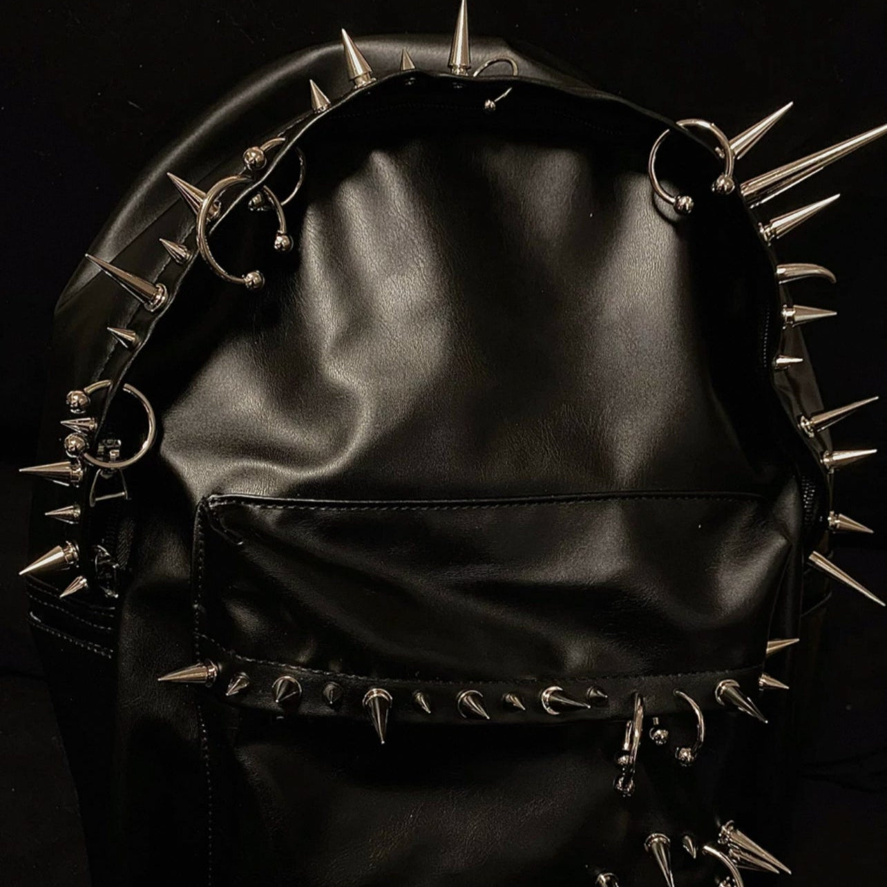 PIERCED BACKPACKS